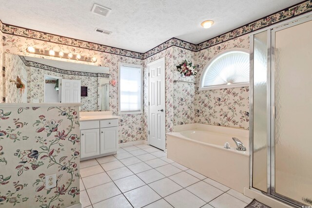 4012 Grousewood Dr, Myrtle Beach, SC 29588 - bathroom featuring tile patterned flooring, vanity, a bath, wallpapered walls, and plenty of natural light