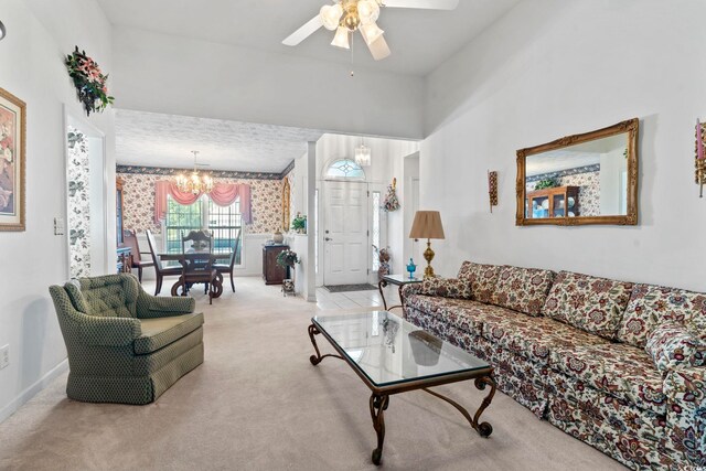 4012 Grousewood Dr, Myrtle Beach, SC 29588 - carpeted living room with a chandelier, a ceiling fan, baseboards, and wallpapered walls
