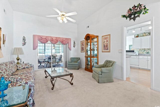 4012 Grousewood Dr, Myrtle Beach, SC 29588 - living room featuring ceiling fan, light colored carpet, and baseboards
