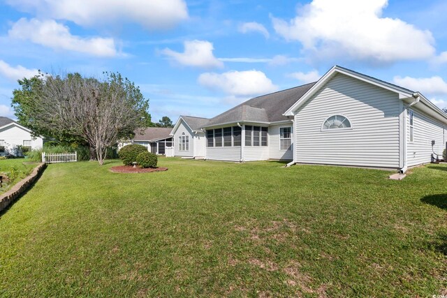 4012 Grousewood Dr, Myrtle Beach, SC 29588 - rear view of house featuring a sunroom