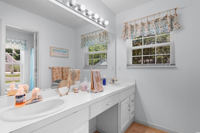 250 Nature Trl, Little River, SC 29566 - bathroom featuring double vanity and healthy amount of natural light