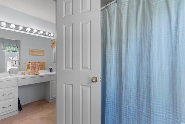 250 Nature Trl, Little River, SC 29566 - bathroom with vanity and a shower with curtain