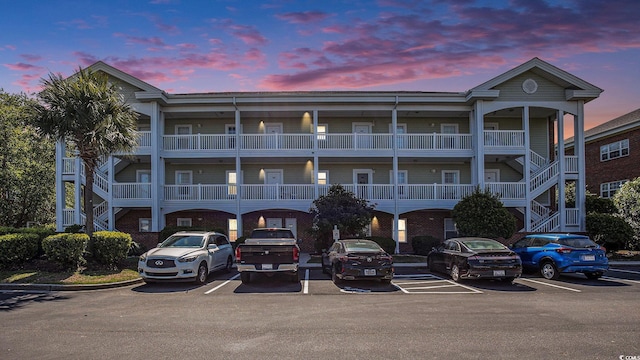 3939 Gladiola Ct Unit 202, Myrtle Beach, SC 29588 - view of building exterior featuring uncovered parking and stairway