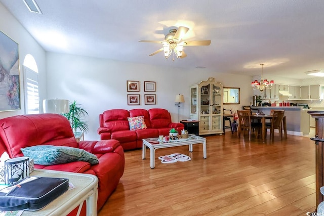1437 Baldwin Ct Unit 1437, Little River, SC 29566 - living area featuring light wood finished floors and a ceiling fan