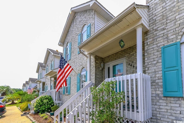 1437 Baldwin Ct Unit 1437, Little River, SC 29566 - view of exterior entry with covered porch