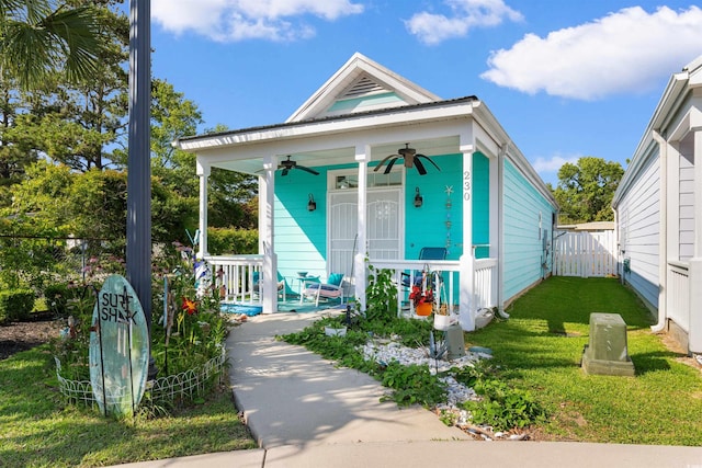 230 Addison Cottage Way, Murrells Inlet, SC 29576 - shotgun-style home featuring a ceiling fan and covered porch