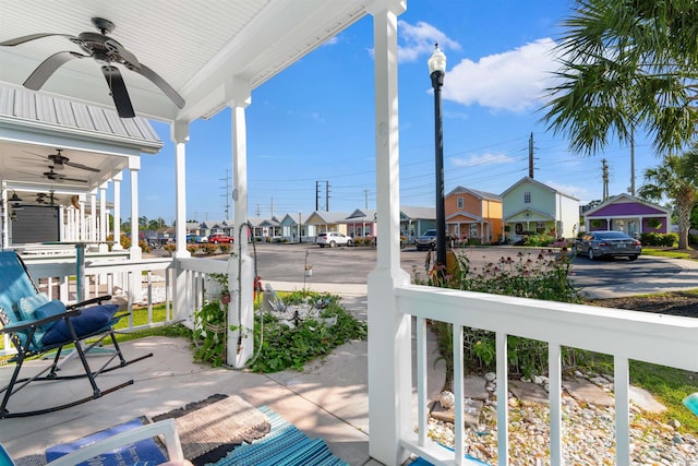 230 Addison Cottage Way, Murrells Inlet, SC 29576 - porch with ceiling fan and a residential view