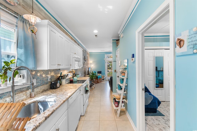 230 Addison Cottage Way, Murrells Inlet, SC 29576 - kitchen with a sink, white appliances, white cabinets, tasteful backsplash, and crown molding
