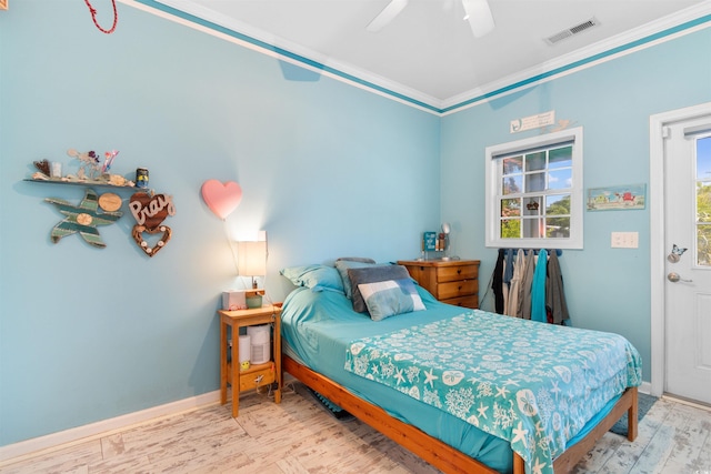 230 Addison Cottage Way, Murrells Inlet, SC 29576 - bedroom featuring wood finished floors, crown molding, a ceiling fan, and baseboards