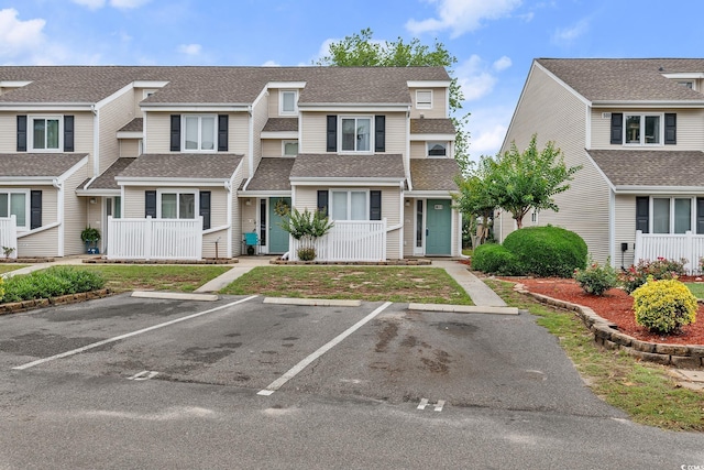 600 Deer Creek Rd Unit D, Surfside Beach, SC 29575 - townhome / multi-family property with uncovered parking and a shingled roof