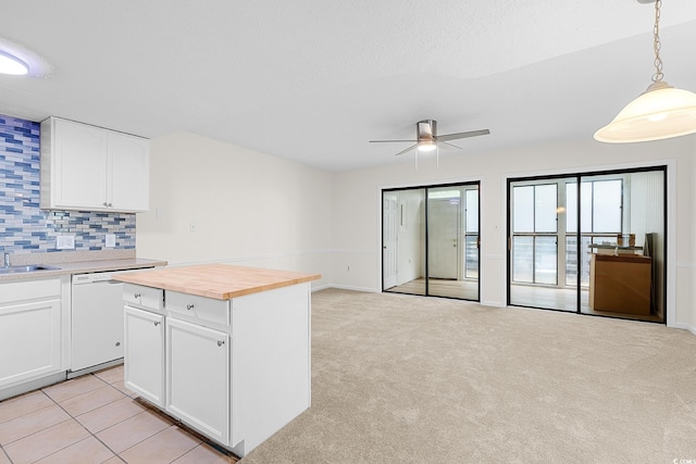 600 Deer Creek Rd Unit D, Surfside Beach, SC 29575 - kitchen with butcher block counters, open floor plan, white dishwasher, tasteful backsplash, and a ceiling fan