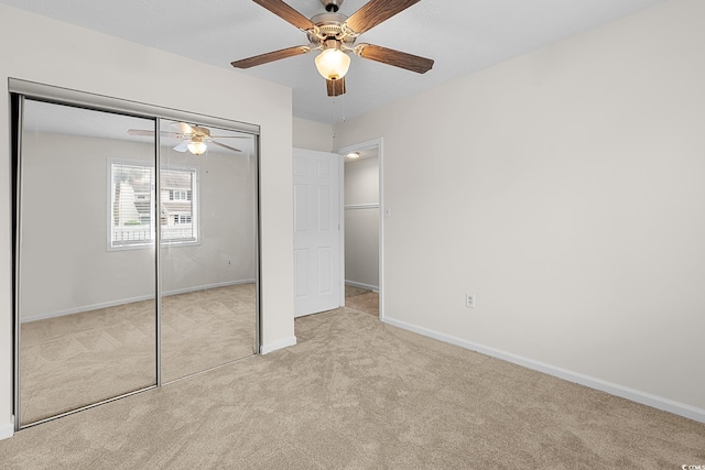 600 Deer Creek Rd Unit D, Surfside Beach, SC 29575 - unfurnished bedroom featuring carpet, a closet, baseboards, and ceiling fan