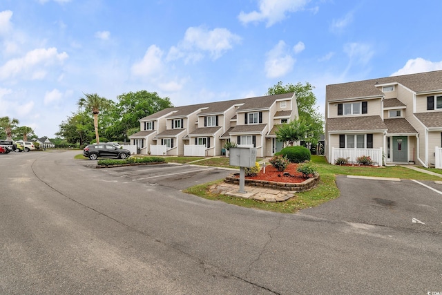 600 Deer Creek Rd Unit D, Surfside Beach, SC 29575 - view of property with uncovered parking and a residential view