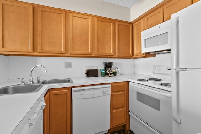 2500 N Ocean Blvd Unit 601, Myrtle Beach, SC 29577 - kitchen with white appliances, a sink, light countertops, and brown cabinets