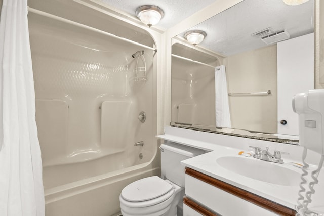 2500 N Ocean Blvd Unit 601, Myrtle Beach, SC 29577 - full bathroom with shower / bath combo with shower curtain, vanity, toilet, and a textured ceiling