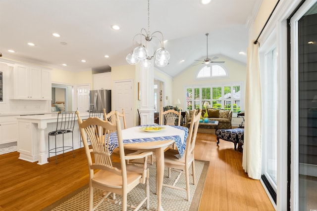 1325 Clipper Dr, North Myrtle Beach, SC 29582 - dining room with a ceiling fan, light wood-type flooring, vaulted ceiling, and recessed lighting