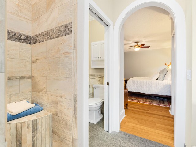 1325 Clipper Dr, North Myrtle Beach, SC 29582 - bathroom featuring a ceiling fan, toilet, and ensuite bathroom