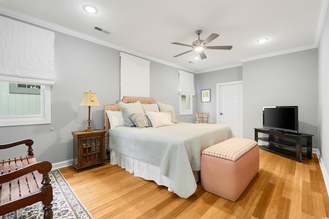 1325 Clipper Dr, North Myrtle Beach, SC 29582 - bedroom featuring light wood finished floors, baseboards, recessed lighting, ornamental molding, and ceiling fan