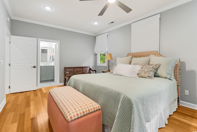 1325 Clipper Dr, North Myrtle Beach, SC 29582 - bedroom with baseboards, light wood-style floors, ornamental molding, recessed lighting, and connected bathroom