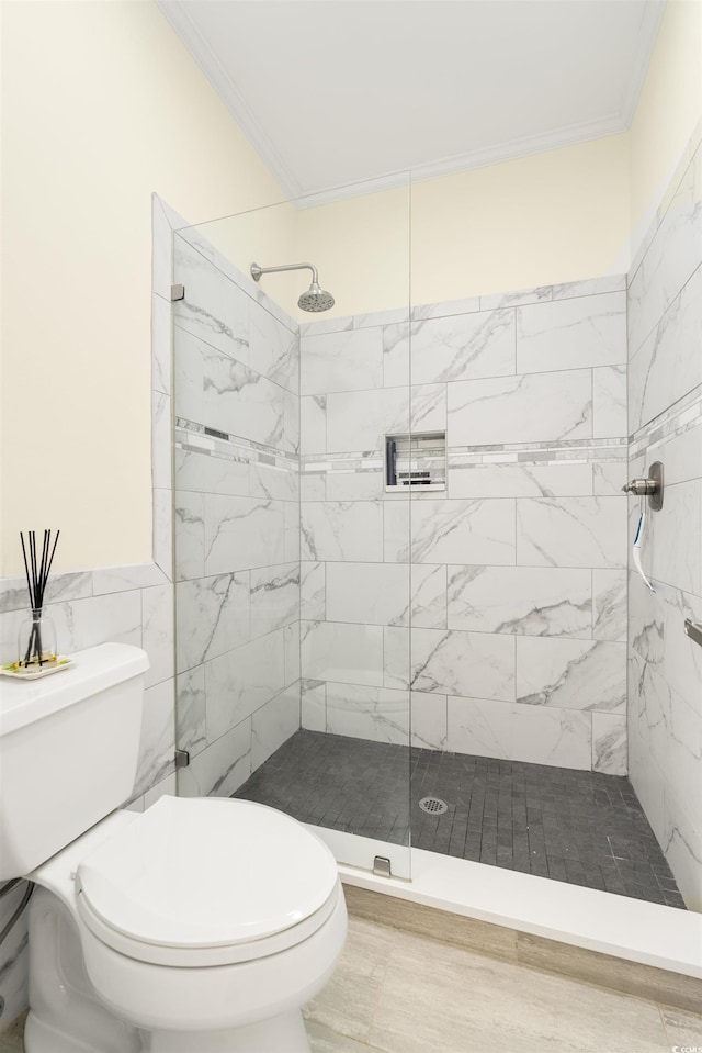 1325 Clipper Dr, North Myrtle Beach, SC 29582 - full bathroom featuring toilet, ornamental molding, tile walls, and a tile shower