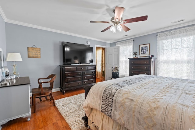 1609 Bridgebrook Ln, Conway, SC 29527 - bedroom with wood finished floors, ornamental molding, ceiling fan, and baseboards