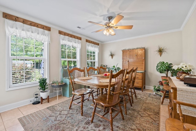 1609 Bridgebrook Ln, Conway, SC 29527 - dining room with light tile patterned floors, ceiling fan, crown molding, and baseboards