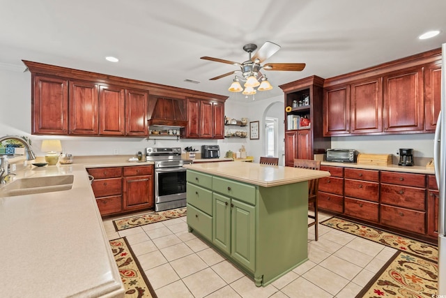 1609 Bridgebrook Ln, Conway, SC 29527 - kitchen with stainless steel electric range oven, a sink, custom exhaust hood, open shelves, and light countertops