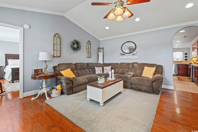 1609 Bridgebrook Ln, Conway, SC 29527 - living room featuring ceiling fan, light wood finished floors, arched walkways, baseboards, and ornamental molding