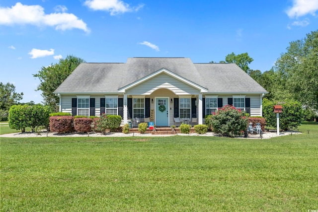 1609 Bridgebrook Ln, Conway, SC 29527 - view of front of property featuring a front yard, covered porch, and a shingled roof