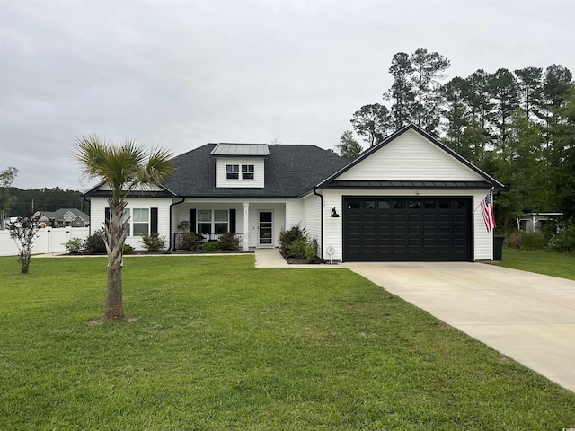 2529 Suzanne Dr, Conway, SC 29526 - modern farmhouse with a garage, driveway, covered porch, and roof with shingles