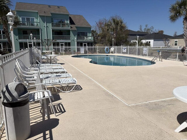 1930 Bent Grass Dr Unit 39H, Surfside Beach, SC 29575 - community pool featuring a patio area