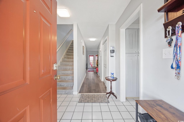 775 Plantation Dr Unit 28, Little River, SC 29566 - entrance foyer featuring light tile patterned floors and stairs
