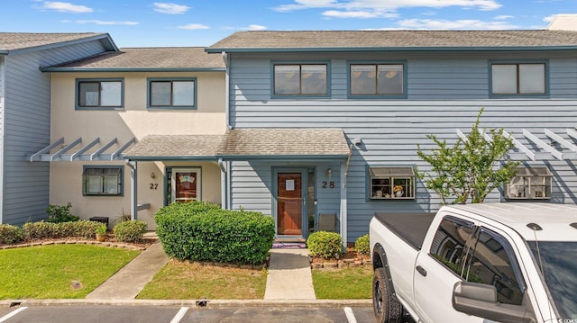 775 Plantation Dr Unit 28, Little River, SC 29566 - townhome / multi-family property featuring uncovered parking and roof with shingles