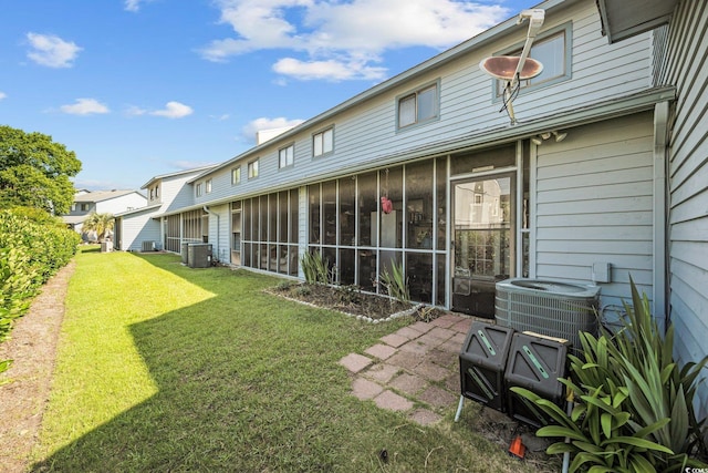 775 Plantation Dr Unit 28, Little River, SC 29566 - view of grassy yard featuring a sunroom