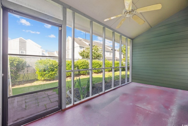 775 Plantation Dr Unit 28, Little River, SC 29566 - unfurnished sunroom with a ceiling fan, lofted ceiling, and a residential view