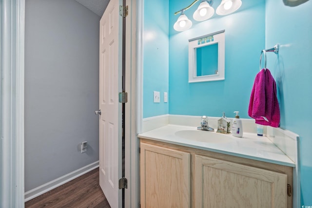 775 Plantation Dr Unit 28, Little River, SC 29566 - bathroom featuring vanity and wood finished floors