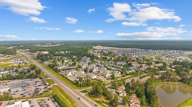 775 Plantation Dr Unit 28, Little River, SC 29566 - aerial view of property and surrounding area featuring a large body of water and nearby suburban area