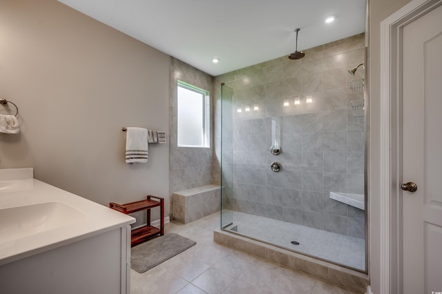 251 Copper Leaf Dr, Myrtle Beach, SC 29588 - bathroom featuring a tile shower, tile patterned flooring, double vanity, and recessed lighting