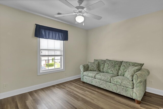 8855 Radcliff Dr NW Unit 53C, Calabash, NC 28467 - sitting room with wood finished floors, baseboards, and a ceiling fan