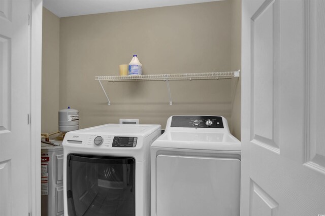 8855 Radcliff Dr NW Unit 53C, Calabash, NC 28467 - laundry area featuring washer and dryer