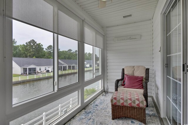 8855 Radcliff Dr NW Unit 53C, Calabash, NC 28467 - sunroom / solarium featuring a water view and a residential view
