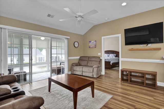 8855 Radcliff Dr NW Unit 53C, Calabash, NC 28467 - living area featuring vaulted ceiling, a ceiling fan, wood finished floors, baseboards, and recessed lighting