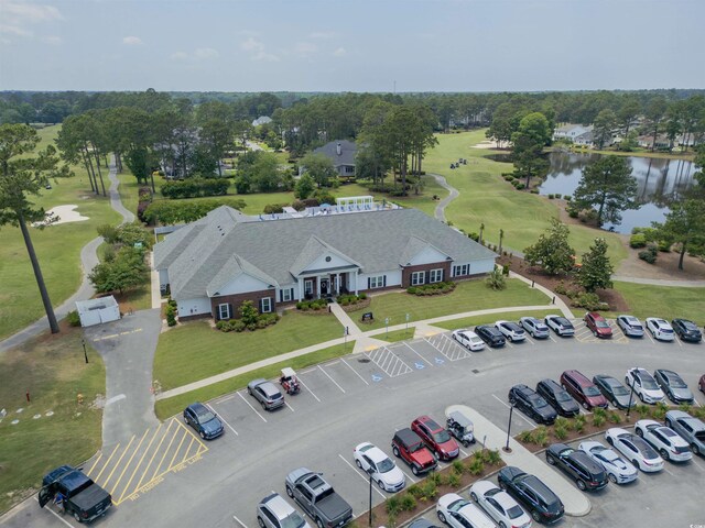 8855 Radcliff Dr NW Unit 53C, Calabash, NC 28467 - aerial view of a large body of water, a golf course, and a tree filled landscape
