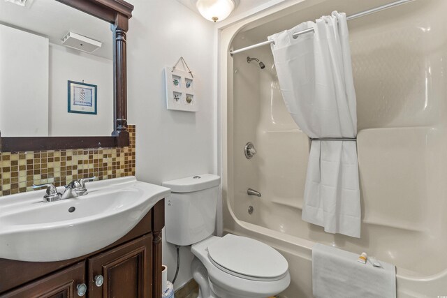 2500 N Ocean Blvd Unit 102, Myrtle Beach, SC 29577 - full bath featuring shower / bath combination with curtain, vanity, decorative backsplash, and toilet