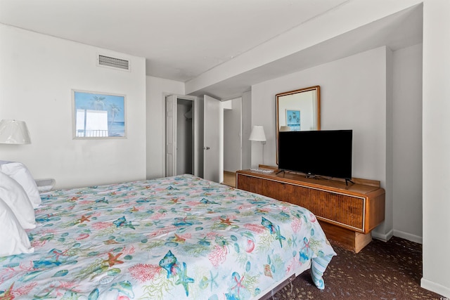 2500 N Ocean Blvd Unit 102, Myrtle Beach, SC 29577 - carpeted bedroom featuring baseboards
