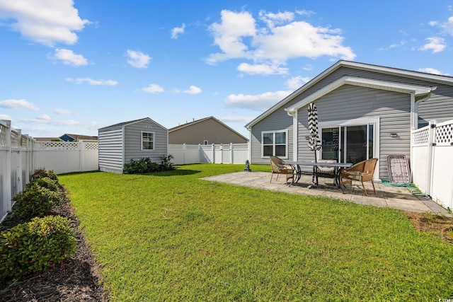 924 Sorano St, Myrtle Beach, SC 29579 - fenced backyard with a patio and a storage unit