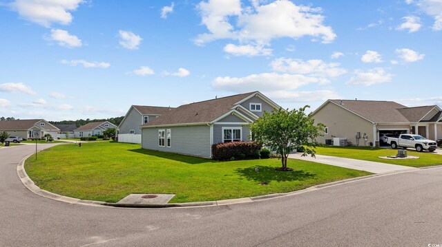 924 Sorano St, Myrtle Beach, SC 29579 - view of front of property with a front lawn, concrete driveway, and a residential view