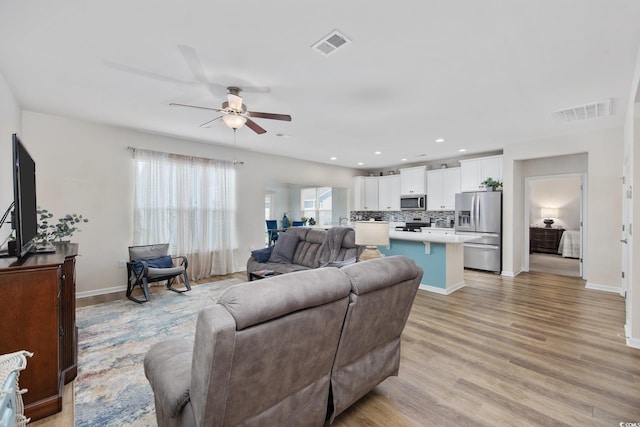 924 Sorano St, Myrtle Beach, SC 29579 - living area with a ceiling fan, light wood-style flooring, and recessed lighting