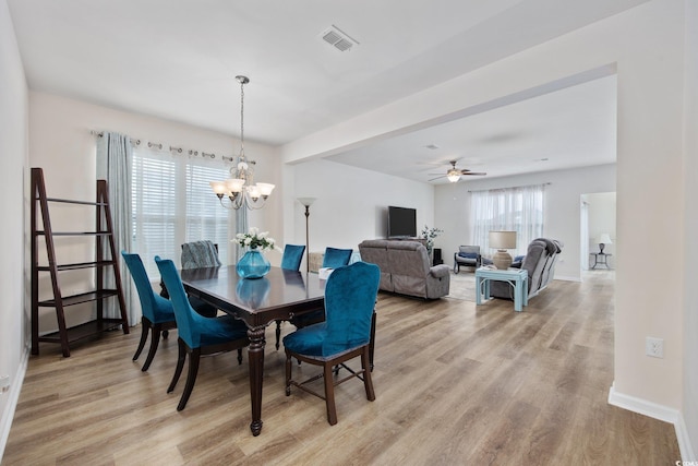 924 Sorano St, Myrtle Beach, SC 29579 - dining space featuring light wood finished floors, ceiling fan, and a chandelier