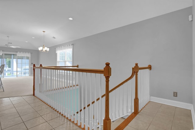 8855 Radcliff Dr NW Unit 53D, Calabash, NC 28467 - corridor with an upstairs landing, tile patterned flooring, plenty of natural light, and recessed lighting